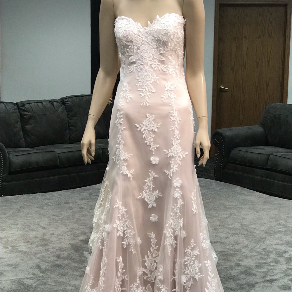 Maggie Sottero’s “Holly” bridal gown.. Ivory/Vintage color.. Size 14